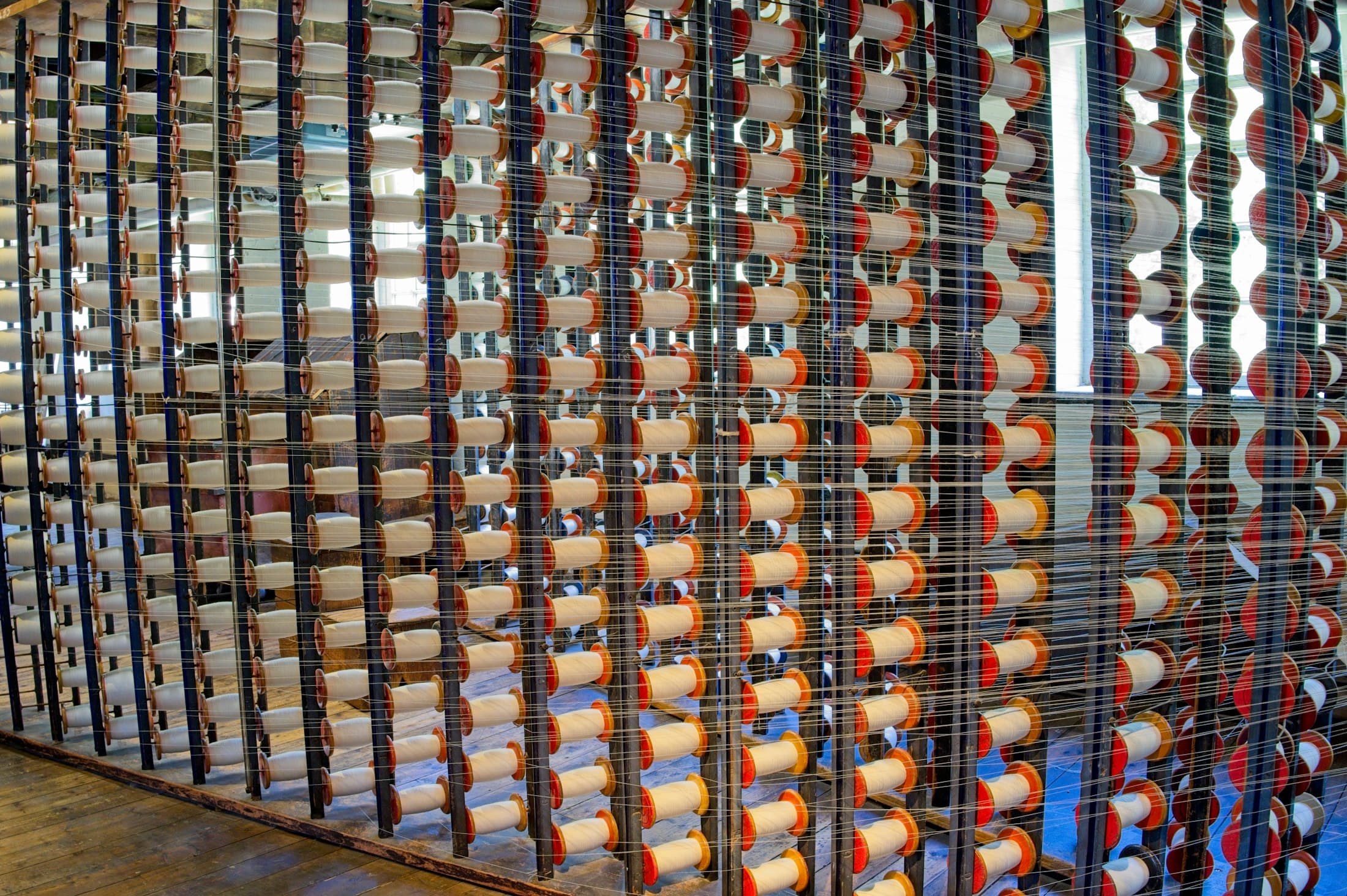 Warping creel: hundreds of cones feeding individual ends toward the beam
