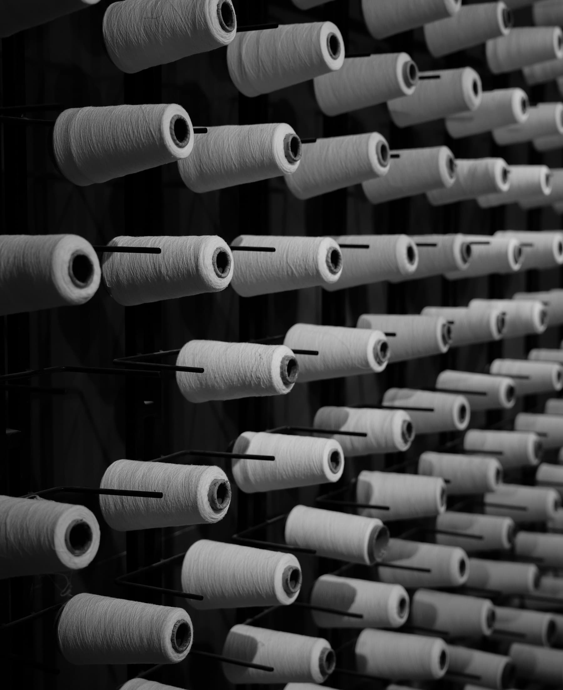 Wall of yarn cones on a creel